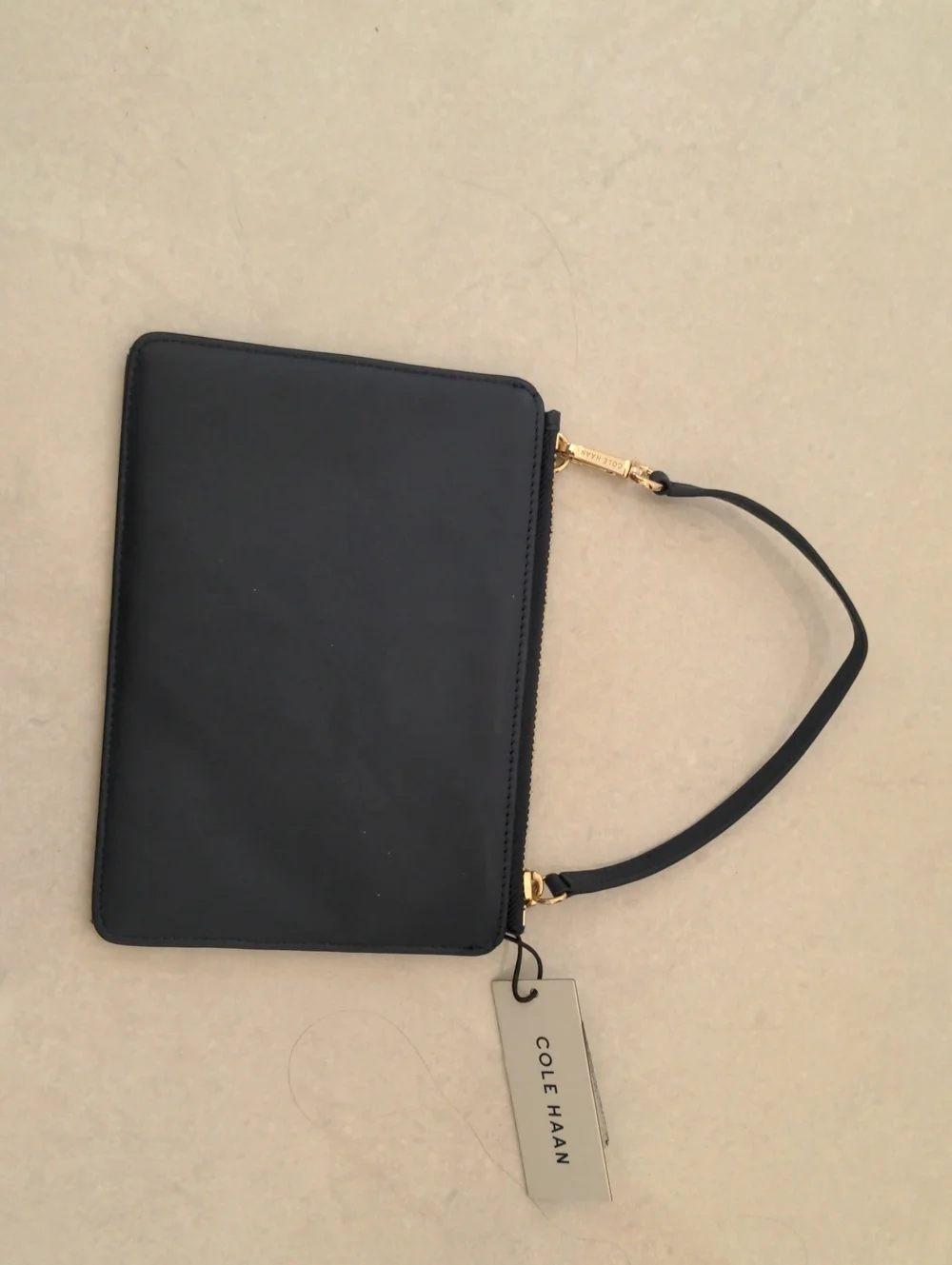 Cole Haan compact wristlet